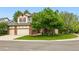 Charming two-story home with a well-manicured lawn and attached two car garage at 1205 W 11Th Ct, Broomfield, CO 80020