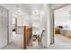 Bright hallway leading to bedrooms, showcasing natural light and inviting access to rooms at 1205 W 11Th Ct, Broomfield, CO 80020