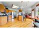 Spacious kitchen with stainless steel appliances and hardwood flooring at 1205 W 11Th Ct, Broomfield, CO 80020