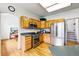 Well-lit kitchen with stainless steel appliances and adjacent dining area at 1205 W 11Th Ct, Broomfield, CO 80020