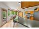Spacious kitchen features a breakfast bar, stainless steel appliances, and ample counter space for cooking at 1205 W 11Th Ct, Broomfield, CO 80020
