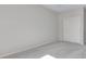 Well-lit bedroom featuring light colored walls and soft carpeting at 10661 Reunion Pkwy, Commerce City, CO 80022
