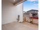 Side exterior of home with concrete patio and fenced yard at 10661 Reunion Pkwy, Commerce City, CO 80022