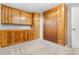 Functional room featuring built-in cabinets and a large closet for ample storage at 1182 S Alcott St, Denver, CO 80219