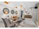 Comfortable living room featuring plush seating, stylish decor, and recessed lighting at 1182 S Alcott St, Denver, CO 80219