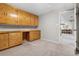 Versatile room featuring built-in cabinetry and a workspace, perfect for a home office or study at 1182 S Alcott St, Denver, CO 80219
