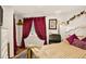 Cozy bedroom featuring hardwood floors, large window and plush textures at 1575 York Gulch Rd, Idaho Springs, CO 80452