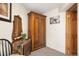 Bedroom with antique wardrobe, dresser, mirror and horse art piece at 1575 York Gulch Rd, Idaho Springs, CO 80452