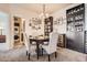 Cozy dining area with seating for four and convenient laundry room access at 7292 S Blackhawk St # 2-204, Englewood, CO 80112