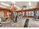 Spacious fitness center offering a variety of exercise equipment, including weight machines and free weights at 7292 S Blackhawk St # 2-204, Englewood, CO 80112