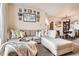 Inviting living room with comfortable seating and adjacent dining area with natural light at 7292 S Blackhawk St # 2-204, Englewood, CO 80112