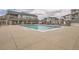 Community pool with ample deck space and nearby seating, perfect for residents to relax and socialize at 7292 S Blackhawk St # 2-204, Englewood, CO 80112