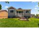 Charming backyard with a patio, a seating area, and a well-manicured lawn at 265 Calhoun Cir, Castle Rock, CO 80104