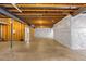 Spacious unfinished basement with concrete floor, exposed ceiling, and framed walls at 265 Calhoun Cir, Castle Rock, CO 80104