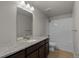 Bathroom featuring granite countertops, dark wood cabinets and a shower/tub combo at 265 Calhoun Cir, Castle Rock, CO 80104