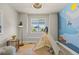 Charming bedroom with a teepee, muraled walls, and natural light from a large window at 265 Calhoun Cir, Castle Rock, CO 80104
