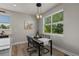 Bright dining area with modern pendant lighting, view to the outside, and modern decor at 265 Calhoun Cir, Castle Rock, CO 80104