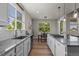 Stylish kitchen with granite countertops, stainless steel appliances, and an island with a gas cooktop at 265 Calhoun Cir, Castle Rock, CO 80104