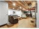 Unfinished basement offering ample space, with visible ceiling beams and plenty of potential at 484 N Jamestown Way, Aurora, CO 80018