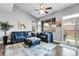 Cozy living room with vaulted ceilings, dark wood floors, and contemporary decor at 484 N Jamestown Way, Aurora, CO 80018