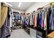 Organized walk-in closet with ample shelving and hanging space at 484 N Jamestown Way, Aurora, CO 80018