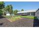 Expansive backyard with garden, shed, and deck, perfect for outdoor living and entertaining at 995 Chase St, Lakewood, CO 80214