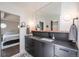 Stylish bathroom vanity area, seamlessly connected to the bedroom for a harmonious flow at 995 Chase St, Lakewood, CO 80214