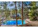 Stunning aerial view of the community pool with surrounding greenery and amenities at 820 Columbine Rd # 10, Breckenridge, CO 80424