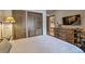 Bedroom featuring a comfortable bed and modern decor with closet and mounted television at 820 Columbine Rd # 10, Breckenridge, CO 80424