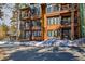 Inviting exterior showcasing multi-story condos with balconies, set amidst a picturesque, snow-kissed natural landscape at 820 Columbine Rd # 10, Breckenridge, CO 80424