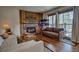 Cozy living room with a fireplace, hardwood floors, and natural light, perfect for relaxing evenings at 820 Columbine Rd # 10, Breckenridge, CO 80424