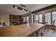 Open concept living area featuring a wood burning fireplace and breakfast nook at 820 Columbine Rd # 10, Breckenridge, CO 80424