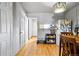 Eat-in kitchen with hardwood floors and view to living room at 2291 S Jasper Way # B, Aurora, CO 80013