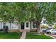 Charming townhome featuring well-maintained front yard, classic design and inviting entrance at 2291 S Jasper Way # B, Aurora, CO 80013