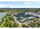 Aerial view showcasing the city skyline, complex, and surrounding greenery at 4200 W 17Th Ave # 621, Denver, CO 80204