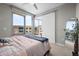 Bedroom with floor to ceiling windows and a view of the city at 4200 W 17Th Ave # 621, Denver, CO 80204