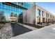 Inviting entrance to a modern building, featuring manicured landscaping and a sleek, covered entryway at 4200 W 17Th Ave # 621, Denver, CO 80204