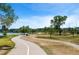 Scenic park pathway winding through lush greenery, perfect for walking, jogging, and enjoying nature at 4200 W 17Th Ave # 621, Denver, CO 80204