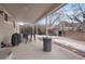 View of covered patio area with outdoor seating, barbecue, and backyard view at 3401 S Glencoe St, Denver, CO 80222