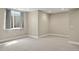 Finished basement with a window for natural light and neutral tones at 15525 W La Salle Ave, Lakewood, CO 80228