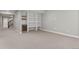 Finished basement with built in shelving, a wine cooler, recessed lighting and neutral walls at 15525 W La Salle Ave, Lakewood, CO 80228
