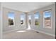 Bedroom with an abundance of natural light and beautiful mountain views from the windows at 15525 W La Salle Ave, Lakewood, CO 80228
