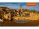 Resort-style community pool featuring stone architecture, landscaping, and the Solterra sign at 15525 W La Salle Ave, Lakewood, CO 80228