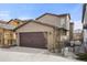 Exterior view of home with attached two car garage and fenced in yard at 15525 W La Salle Ave, Lakewood, CO 80228