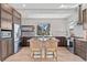 Beautiful kitchen with stainless steel appliances, white countertops, and modern cabinetry at 15525 W La Salle Ave, Lakewood, CO 80228