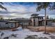 Beautiful contemporary home with stone accents, a rounded tower feature, and stylish rooflines at 11505 Conifer Ridge Dr, Conifer, CO 80433