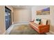 Bright living room with a view of the mountains from the sliding glass doors, featuring modern decor at 11505 Conifer Ridge Dr, Conifer, CO 80433