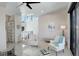 Bright living room with comfortable seating, modern decor, and abundant natural light at 11505 Conifer Ridge Dr, Conifer, CO 80433