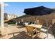 Spacious backyard featuring a patio with comfortable seating and dining area at 1828 Blue Oak Ct, Castle Rock, CO 80104
