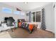 Bright bedroom featuring a sporty theme, cozy carpet and natural lighting at 1828 Blue Oak Ct, Castle Rock, CO 80104